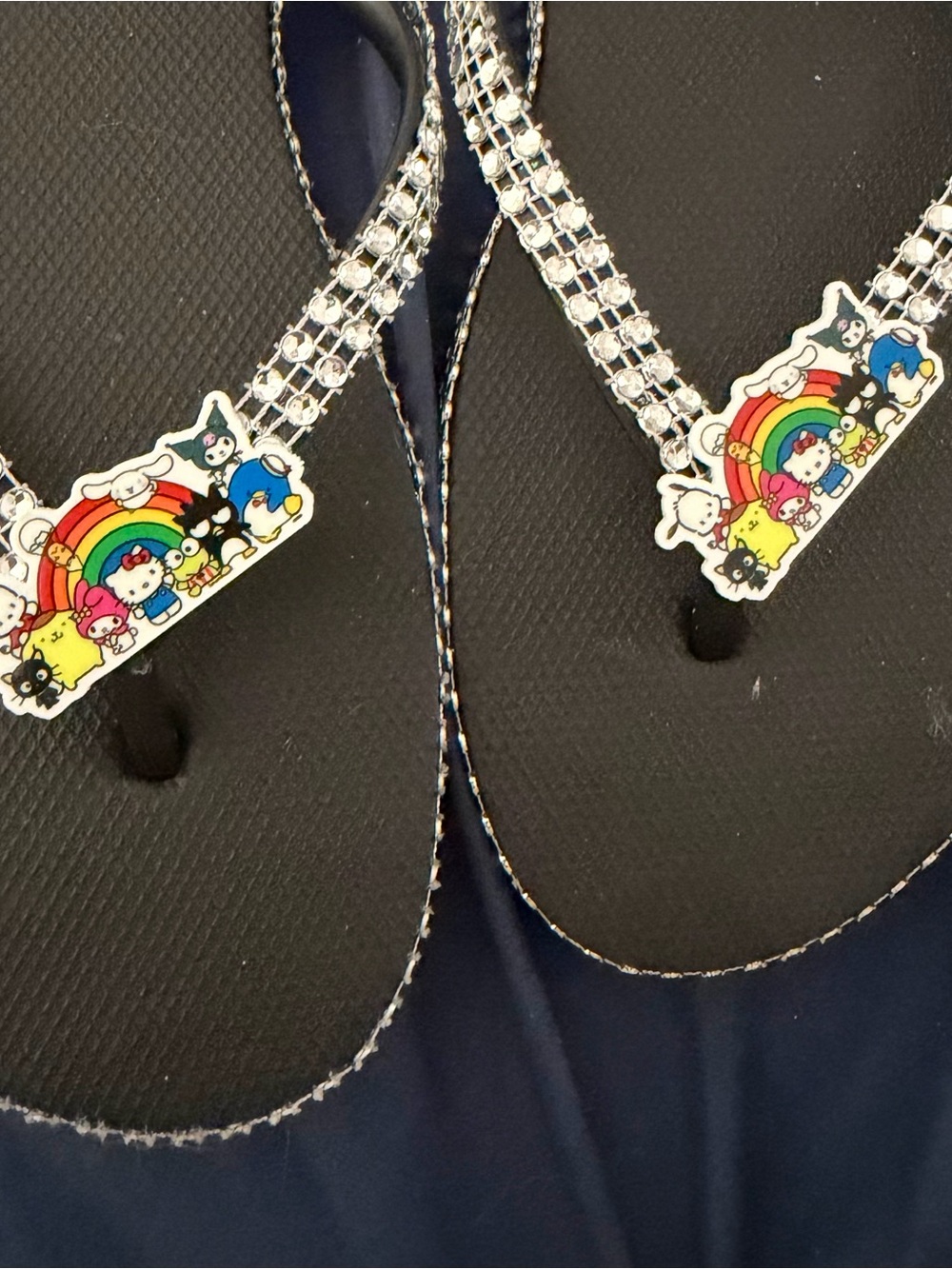 Black Rhinestone Flip Flops with Colorful Character Accent